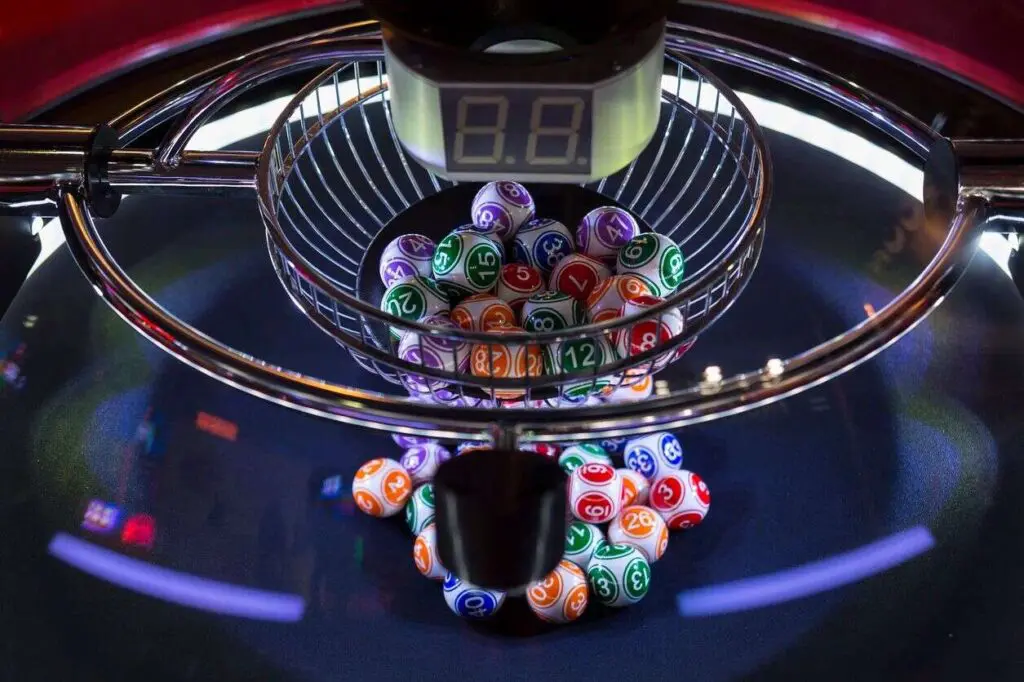 A spinning wheel with many dice in it