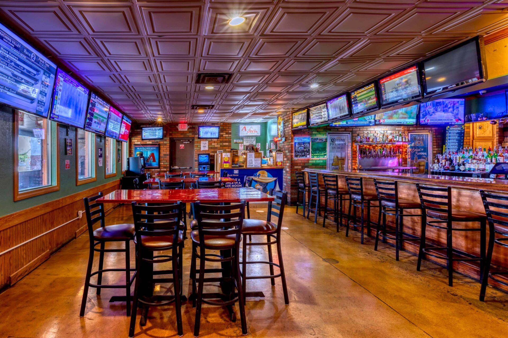 A painting of a bar with many tvs on the wall